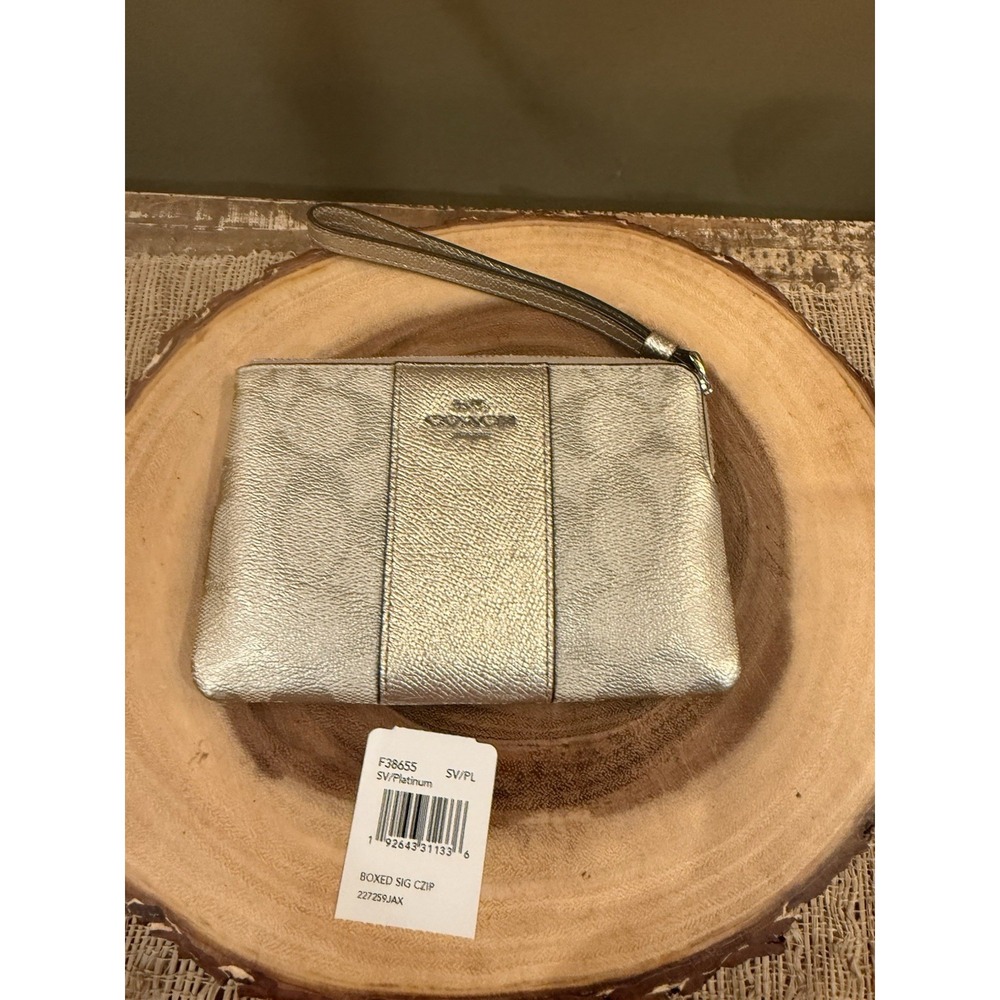 NWT Coach Platinum Gold Logo Signature Corner Zip Wristlet 128$